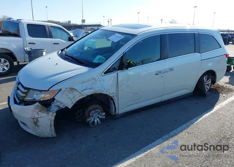 2014 Honda Odyssey Ex-L z USA, uszkodzony, nr VIN 5FNRL5H65EB012528